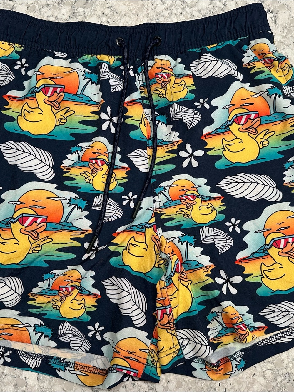 Neff Navy Swim Trunks with Yellow Duck & Orange Sunset Print
